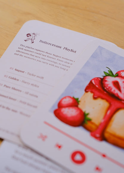 The August 2026 illustrated strawberry print alongside the Buttercream playlist card.