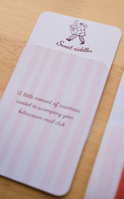 The August 2026 sweet riddles card, this month's surprise insert.